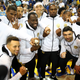 The Golden State Warriors display their 2017 NBA championship rings prior to their NBA game against the Houston Rockets at Oracle Arena on Oct. 17, 2017, in Oakland, Calif.